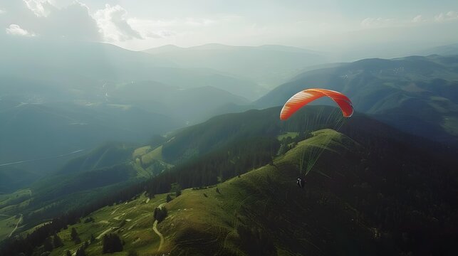 Paragliding in the mountains where paragliders soar