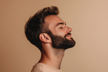 Obraz premium A close up of a man's face with her eyes closed