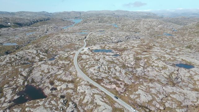 Beautiful nature with a road on sunny day in summer close to Lysebotn town in Norway