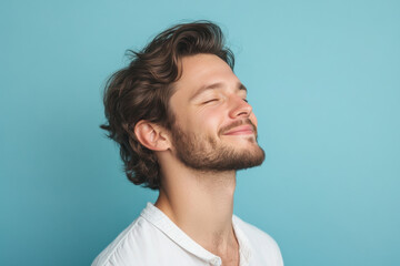 Obraz premium A close up of a man's face with his eyes closed