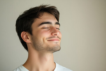 Fototapeta premium A close up of a man's face with his eyes closed