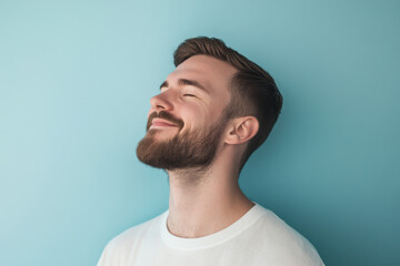 Fototapeta premium A close up of a man's face with his eyes closed