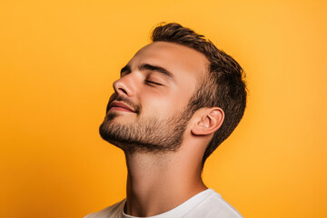 Obraz premium A close up of a man's face with his eyes closed