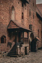Castle Tower and Brick Walls on a Cloudy Day © Aliaksandr