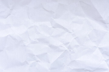 Sheet of crumpled white paper, background, texture
