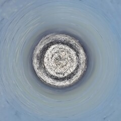 Aerial view of a round hole in the ground. Abstract background