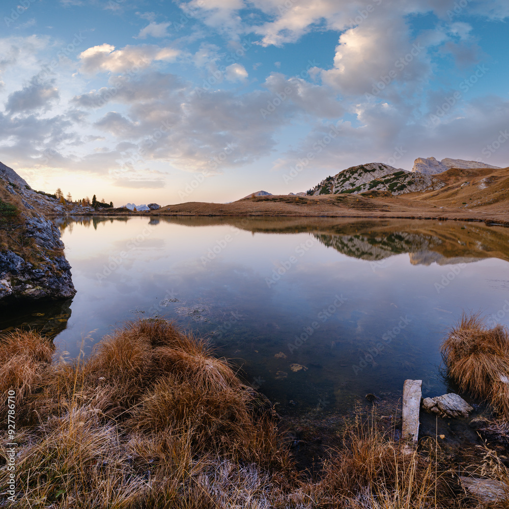 Canvas Prints early morning autumn alpine dolomites mountain scene. peaceful valparola pass and lake view, belluno