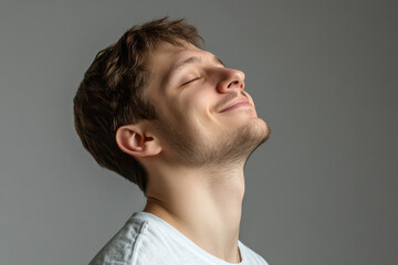 Fototapeta premium A close up of a man's face with his eyes closed