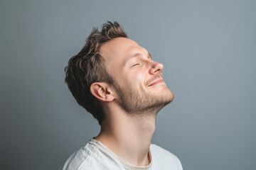Fototapeta premium A close up of a man's face with his eyes closed