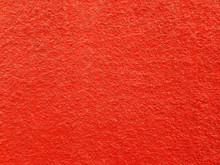 Red Surface Cement Wall Painted Texture. Abstract rough cement wall background.