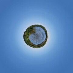 Little planet transformation of spherical panorama 360 degrees. Spherical abstract aerial view in blue sky with clouds. Curvature of space.