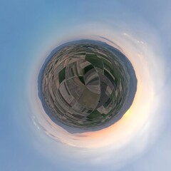 Small planet transformation of spherical panorama 360 degrees. Spherical abstract aerial view with beautiful clouds. Curvature of space.