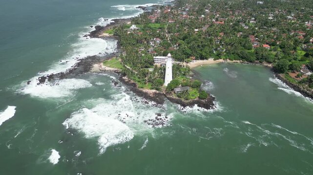 Aerial view of the historic Dondra Lighthouse in Sri Lanka, capturing the pristine coastal surroundings and the majestic structure in its natural - Unedited