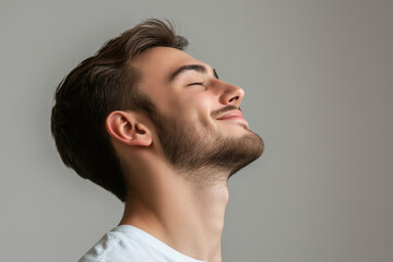 Fototapeta premium A close up of a man's face with his eyes closed