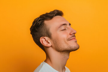 Obraz premium A close up of a man's face with his eyes closed