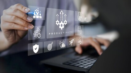 A business person using laptop with visual screen increase productivity concept.