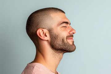 Fototapeta premium A close up of a man's face with his eyes closed