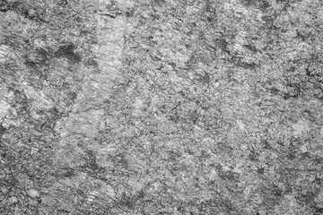 Empty rough grey natural stone surface for abstract background and texture. beautiful patterns, space for work, banner, seamless wallpaper close up.