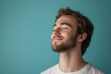 Obraz premium A close up of a man's face with his eyes closed