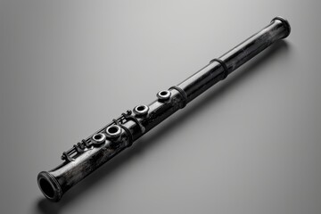 Fototapeta premium Gray background holding iron flute
