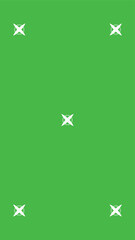 Green screen background, VFX motion tracking markers. Art design green screen backdrop template. Abstract concept video footage replacement tracking markers element.	