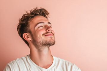 Fototapeta premium A close up of a man's face with his eyes closed