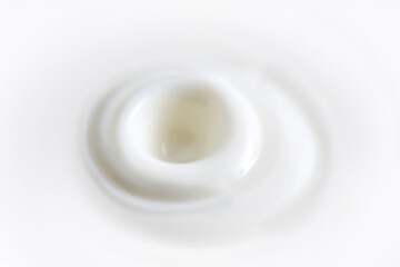 drop splashing cream of milk