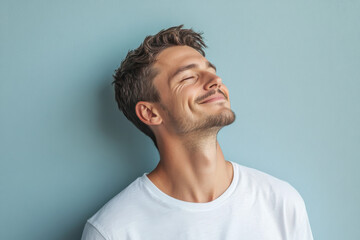 Obraz premium A close up of a man's face with his eyes closed