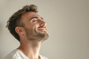 Obraz premium A close up of a man's face with his eyes closed