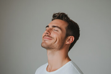 Obraz premium A close up of a man's face with his eyes closed