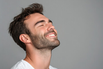 Obraz premium A close up of a man's face with his eyes closed