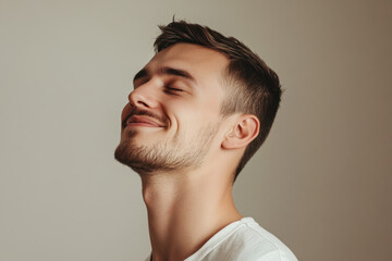 Obraz premium A close up of a man's face with his eyes closed