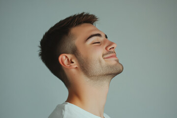 Obraz premium A close up of a man's face with his eyes closed