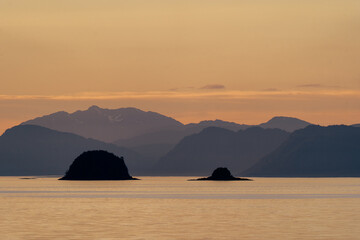 Stephen's Passage at sunset along Southeast Alaskan coastline along the inside passage in summer