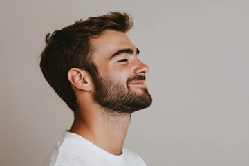 Obraz premium A close up of a man's face with his eyes closed