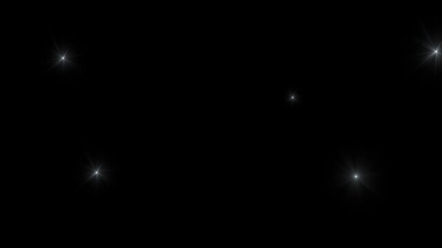 Camera flashes of photographers on a black background. Photo camera flashes on the stadium, music festival, sport arena or Fashion event.