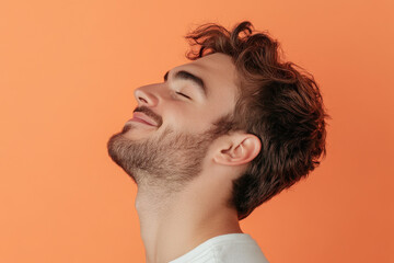 Fototapeta premium A close up of a man's face with his eyes closed