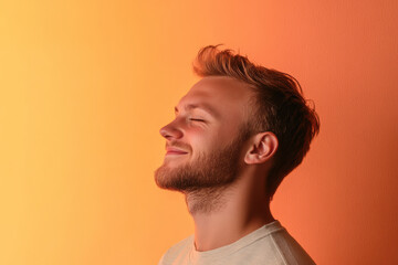 Obraz premium A close up of a man's face with his eyes closed