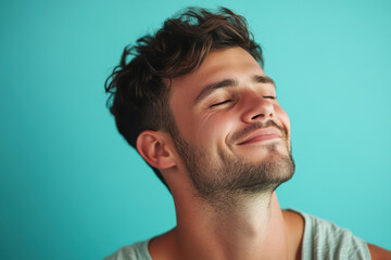 Fototapeta premium A close up of a man's face with his eyes closed