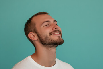 Fototapeta premium A close up of a man's face with his eyes closed