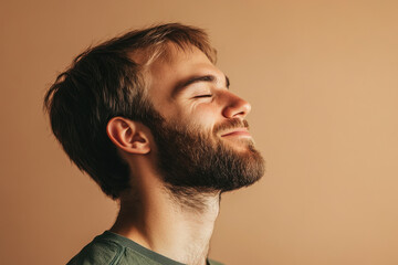 Obraz premium A close up of a man's face with his eyes closed