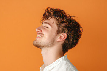 Obraz premium A close up of a man's face with his eyes closed