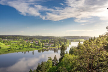 A beautiful view of a river with a town in the background