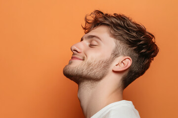 Fototapeta premium A close up of a man's face with her eyes closed