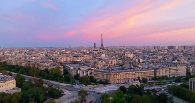 Eiffel Tower at Sunset Rising Drone Video in Paris France Cityscape (Aerial 4k Skyline)