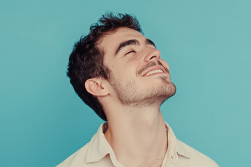 Obraz premium A close up of a man's face with his eyes closed