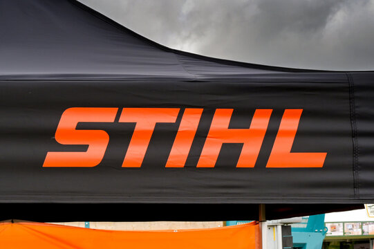 Penllyne, Cowbridge, Vale of Glamorgan, Wales, UK - 7 August 2024: Close up view of the sign on top of an exhibition stand for Stihl agricultural equipment