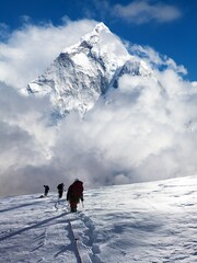 montage of three hikers on glacier and mount Ama Dablam