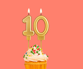 Birthday number 10 - Golden candle with cupcake