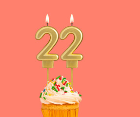 Birthday number 22 - Golden candle with cupcake